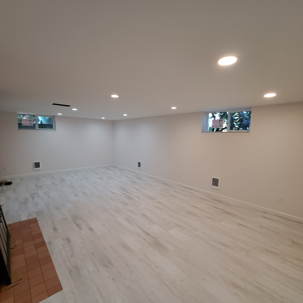Laminate floor installation finalized 0<br />laminate vinyl plank flooring installation in Seattle hold downstairs with the staircase