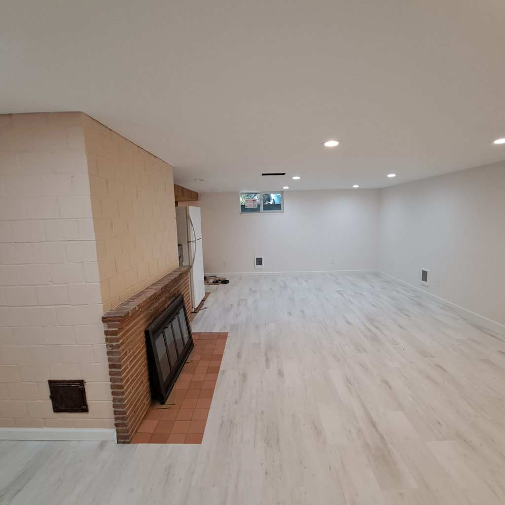 Laminate floor installation finalized 0<br />laminate vinyl plank flooring installation in Seattle hold downstairs with the staircase